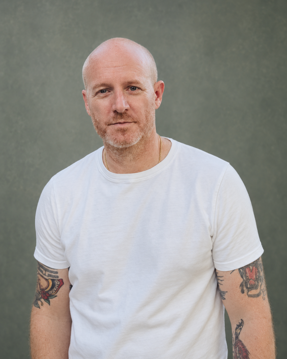 Sam Weston in a white T-shirt
